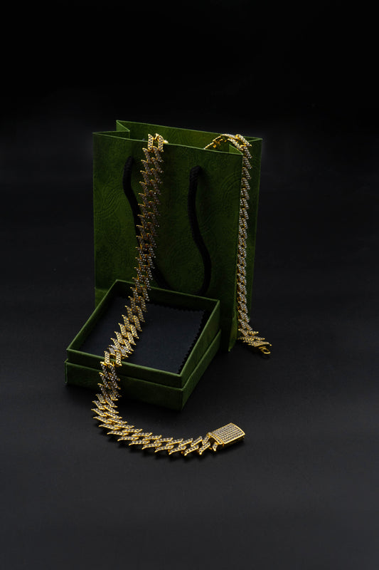 Oversized leaf-shaped with pointed edges featuring a hip-hop Cuban chain design fully encrusted with diamonds 24 INCH ONLY